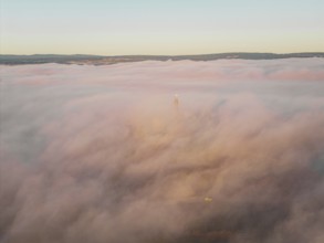 Sunrise over a sea of clouds creating a soft and peaceful atmosphere, Gechingen, Calw district,