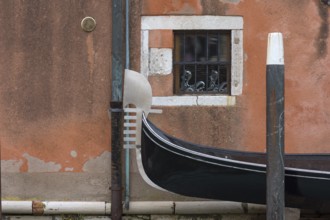 The metal tail of a gondola, the six stripes symbolize the six districts of Venice, Venice, Veneto,