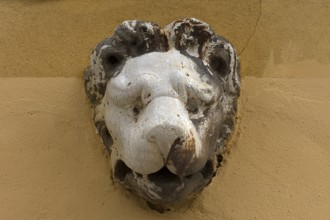 Sculpture of a lion's head above an entrance, Venice, Veneto, Italy