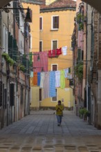 Laundry hung up for tourists in the Castello district, Venice, Veneto, Italy