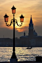 Silhouette of San Giorgio Maggiore church at sunset, Venice, Veneto, Italy