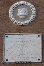 1919 sundial on the right tower to the Arsenal, the Lion of St. Mark at the top, Venice, Veneto,