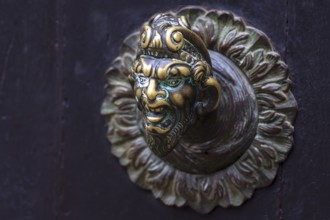 Fantasy male figure as doorknob, Venice, Veneto, Italy