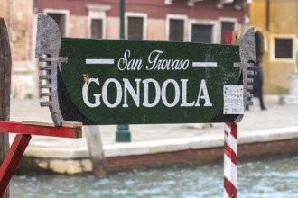 Sign for gondola rides, Venice, Veneto, Italy