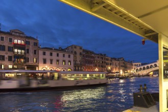 View of the Palazzi on the Grand Canal from a moving traghetto, Venice, Veneto, Italy