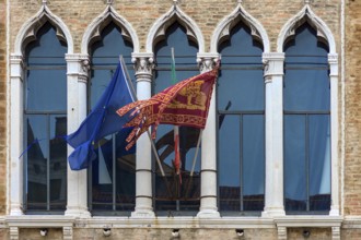 Waving flags of Europe and the Republic of Venice at Palazzo Zaguri, Venice, Venice, Italy