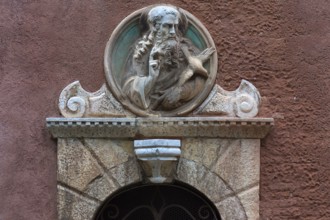 God the Father sculpture with a dove over a gate, Venice, Veneto, Italy