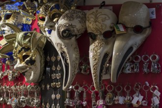 Venician carnival masks at a sales stand, Venice, Veneto, Italy