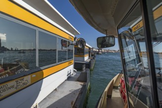 Stops at San Marco on the Grand Canal, right part of a mooring traghetto, Venice, Veneto, Italy