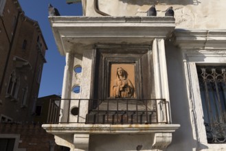 Adoration of Mary at a residential building, Venice, Veneto, Italy