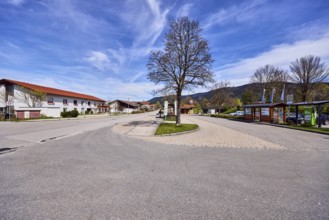 Inzell bus station, general architecture, residential buildings, bare winter trees, blue sky,