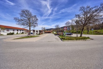 Inzell bus station, parking lot with cars, general architecture, residential buildings, bare winter