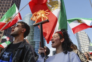 Iranians demonstrate on the day of the US and Israeli attack on Iran in Berlin, 28.02.2026. People