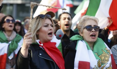 Iranians demonstrate on the day of the US and Israeli attack on Iran in Berlin, 28.02.2026. Many