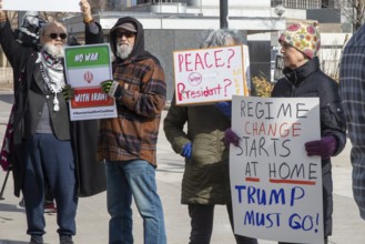 Detroit, Michigan - People gather in downtown Detroit to protest President Trump's decision to