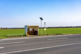 Bus stop in the countryside, Lower Rhine, school bus stop, individually designed, near Alps, North