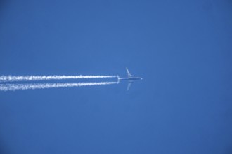 Airplane, with contrails