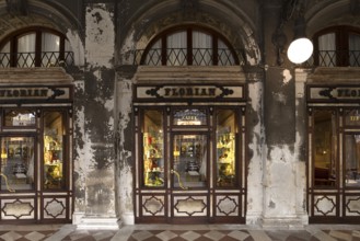 Historic Caffé Florian in the arcades of the old Procuration, 16th century early in the morning,