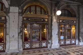Historic Café Florian in the arcades of the old Procuration, 16th century early in the morning,
