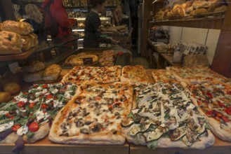 Shop window with baked pizzas, Venice, Veneto, Italy