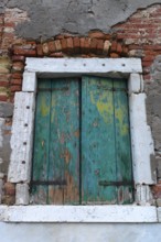 Dilapidated window façade in the old town, Venice, Veneto, Italy