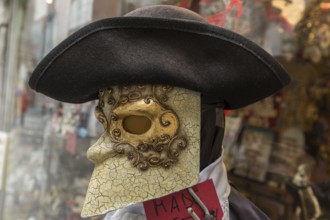 Venetian mask in front of a shop, Venice, Veneto, Italy