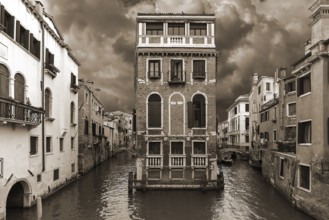 Historic Palazzo Tetta surrounded by canals, sepia, Venice, Veneto, Italy