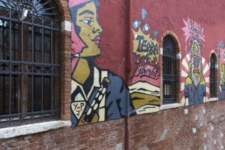 Graffiti on a factory wall, Venice, Veneto, Italy