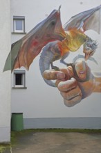 Mural Game of Thrones by CASE maClaim 2016, holding a dragon, fingers, street art, graffiti, Bad