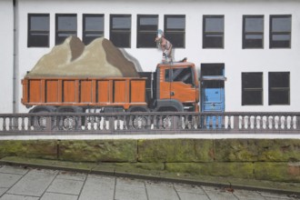 Mural construction by Jaune 2020, alleyway art, graffiti, balustrade, dump truck, construction site