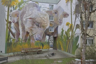 Mural sheep from CASE 2022, graffiti, street art, sheep figures, dandelions, meadow with yellow