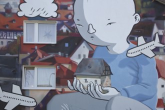Mural by CASE MacAclaim and Millo, street art, graffiti, child carrying house in hands,