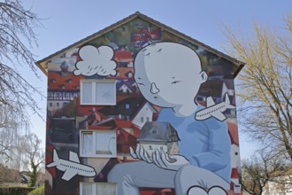 Mural by CASE MacAclaim and Millo, street art, graffiti, child carrying house in hands,