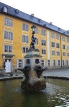 Fountain with lantern in the courtyard, Heidecksburg Castle, the former residence of the Princes of
