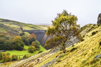 Autumn colors over Claerwen Dam, Claerwen Valley, Elan Valley Reservoir, Rhayader, Powys, Wales, UK