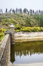 Autumn colors over Pen y Garreg Dam and Reservoir, Elan Valley, Rhayader, Powys, Wales, UK