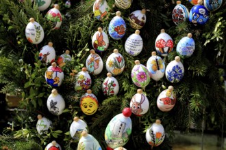 Detail, eggs painted by children, comic characters, Easter fountain in Heiligenstadt, Franconian