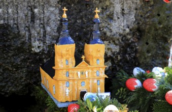 The monastery church Vierzehnheiligen as a model built into an Easter fountain, Franconian