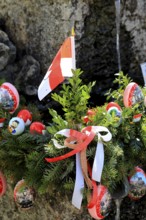 Detail of an Easter fountain in Franconian colors red and white, Franconian Switzerland, in