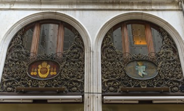 Artfully forged window grilles at the branch of the Wiener Habig Hutfabrik, since 1882 in Venice,