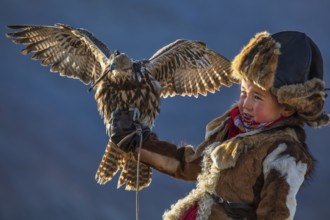 Bayan-Ölgii, Mongolia. The berkutchi are traditional eagle hunters who train Golden Eagle to hunt