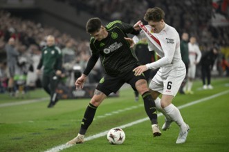 Tackle, action Tomas Cvancara Celtic Glasgow FC (11) vs Angelo Stiller VfB Stuttgart (06) shirt