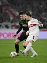 Tackle, action Tomas Cvancara Celtic Glasgow FC (11) vs Angelo Stiller VfB Stuttgart (06) Football