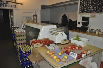 An ancient shop counter with fresh fruit, vegetables and preserves ready for sale, Mitchell,