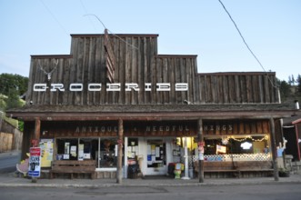 A rustic wooden grocery store marked 'Groceries', Mitchell, Oregon, USA