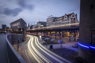 Café ALEX Hamburg Überseebrücke an den Landungsbrücke at the Blue Hour with light strips from