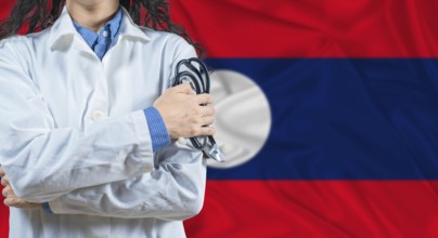 Healthcare professional with Laos flag background. Professional doctor holding stethoscope on Laos