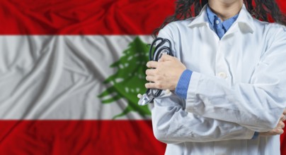Healthcare professional with Lebanon flag background. Professional doctor holding stethoscope on