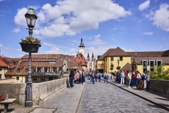 Old Main bridge, footbridge, concrete wall, lantern, suspended flower pot, houses, bridge saint,