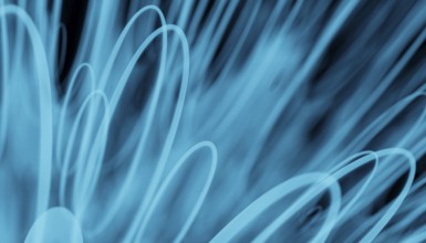 This captivating 3D render depicts an abstract background of swirling blue lines that create a